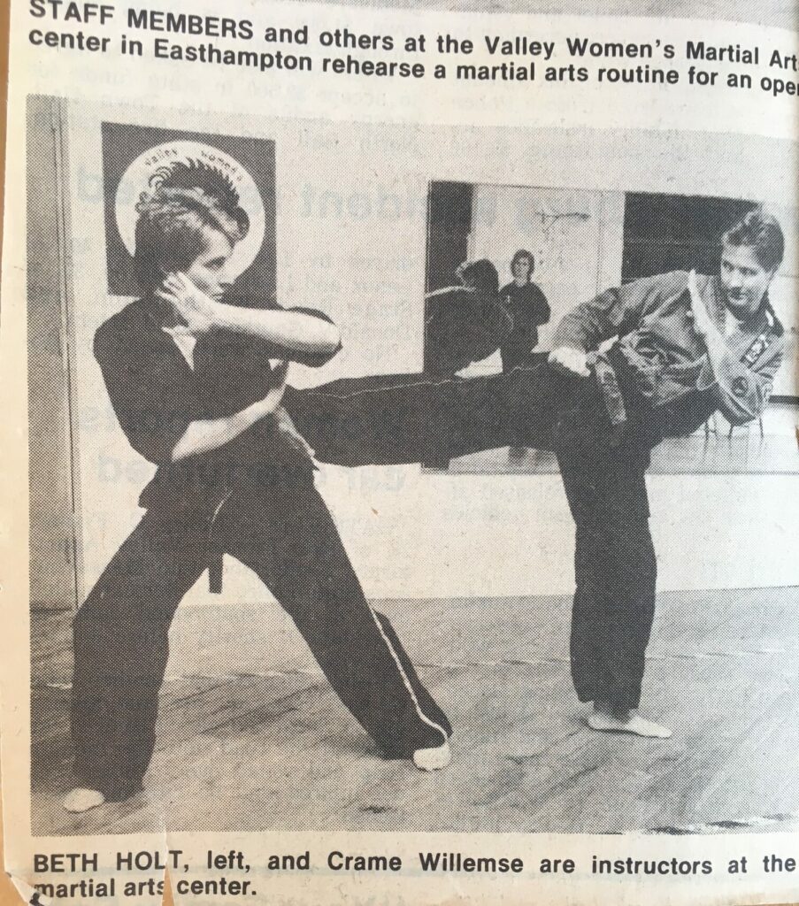 Vintage newspaper photo of Beth Holt and Crame Willemse demonstrating martial arts kick at Valley Women's Martial Arts Easthampton
